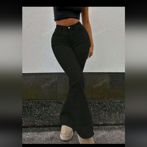 Black Flared Jeans with Pink Bow Detail - Picture 2 of 4